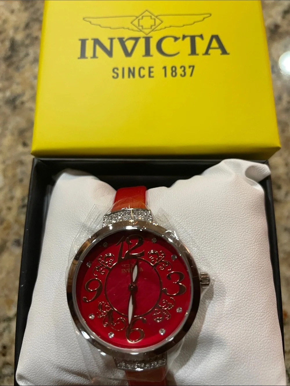 Invicta Women's Red Dial Watch with Silver Accents